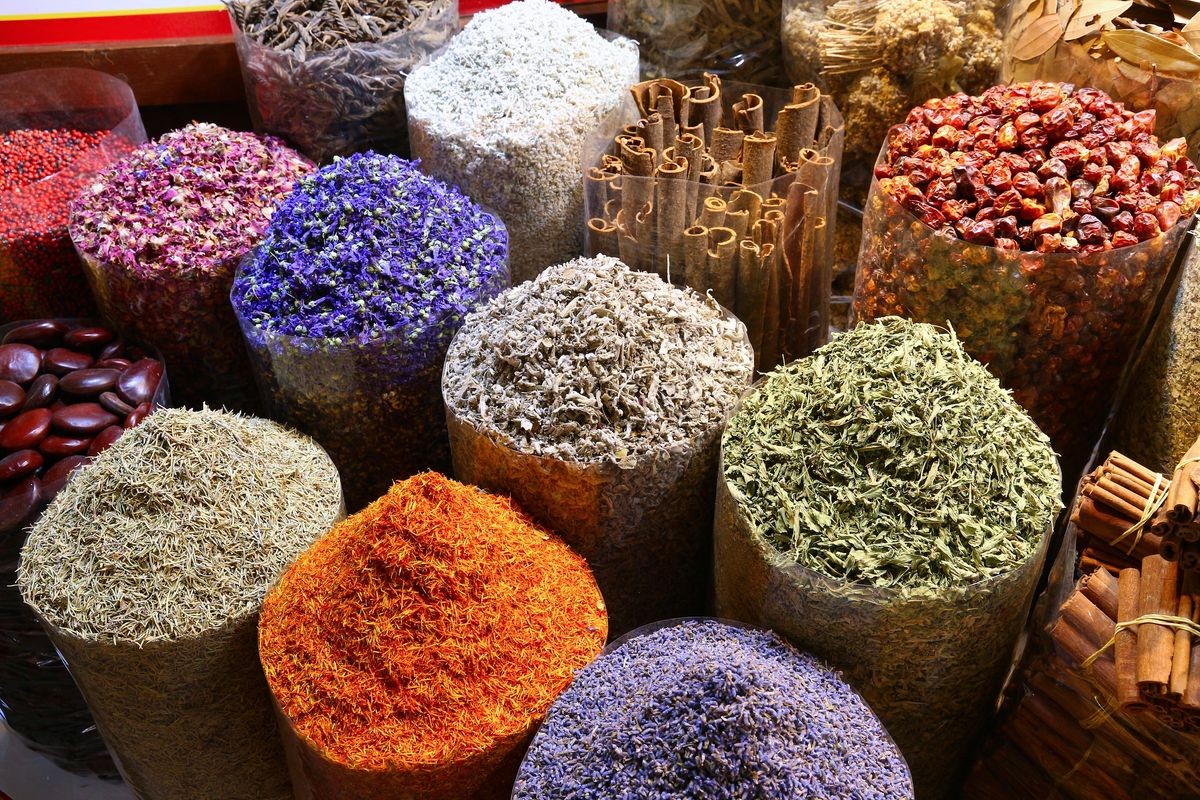 Colorful spices and herbs selection at Dubai Spice Souk.