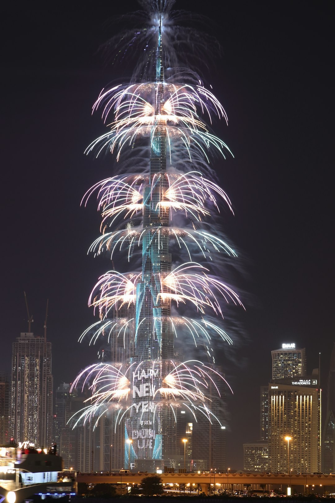 Burj Khalifa with a lot of fireworks in the sky on new year